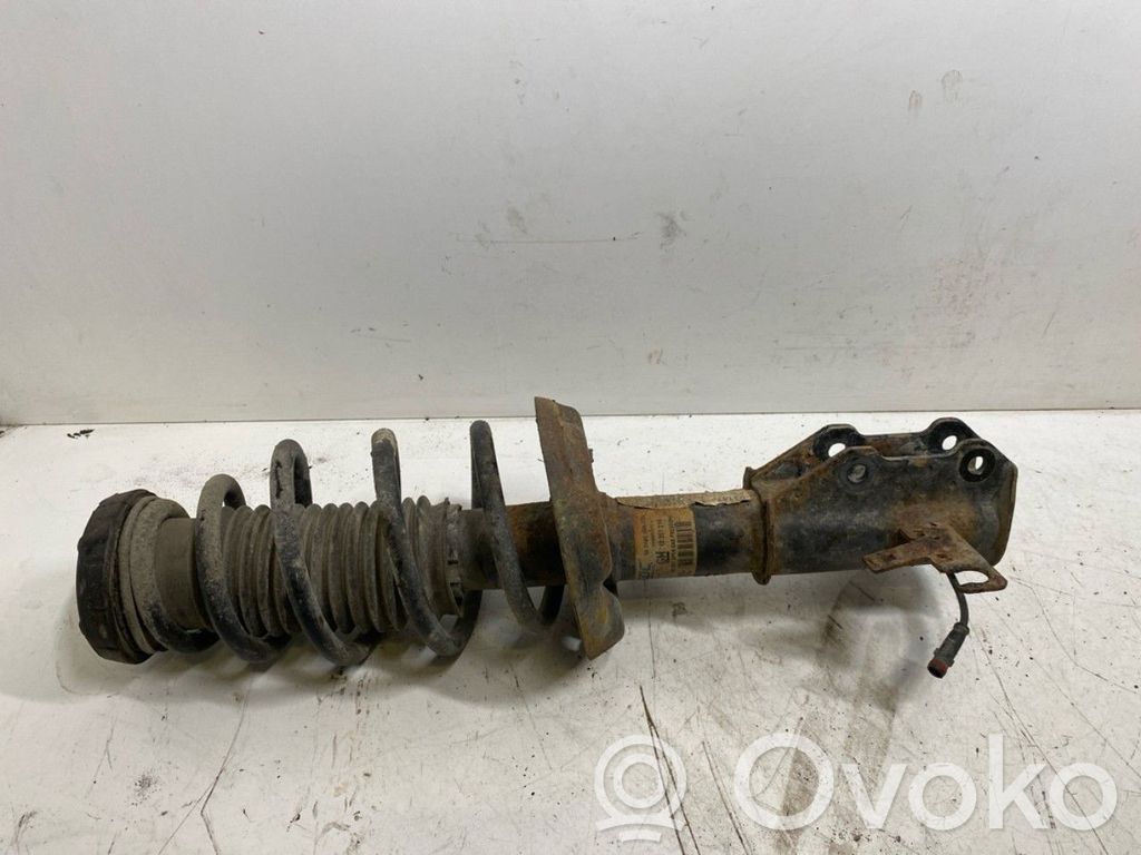 Opel Astra J Amortyzator osi przedniej ze sprężyną 