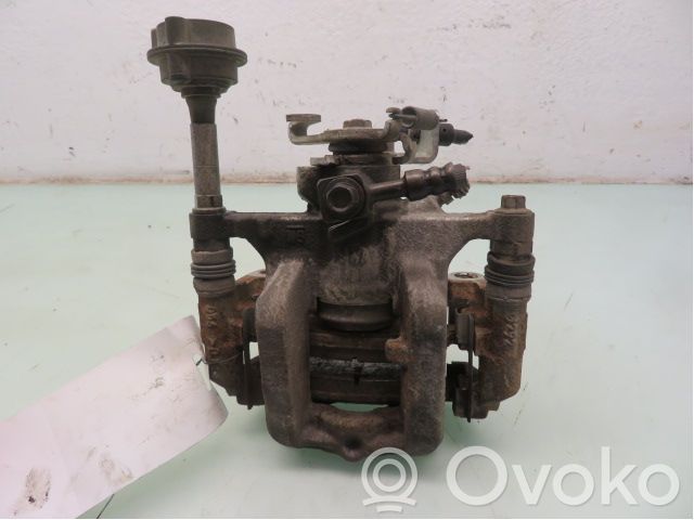 Opel Astra J Tylny zacisk hamulcowy 