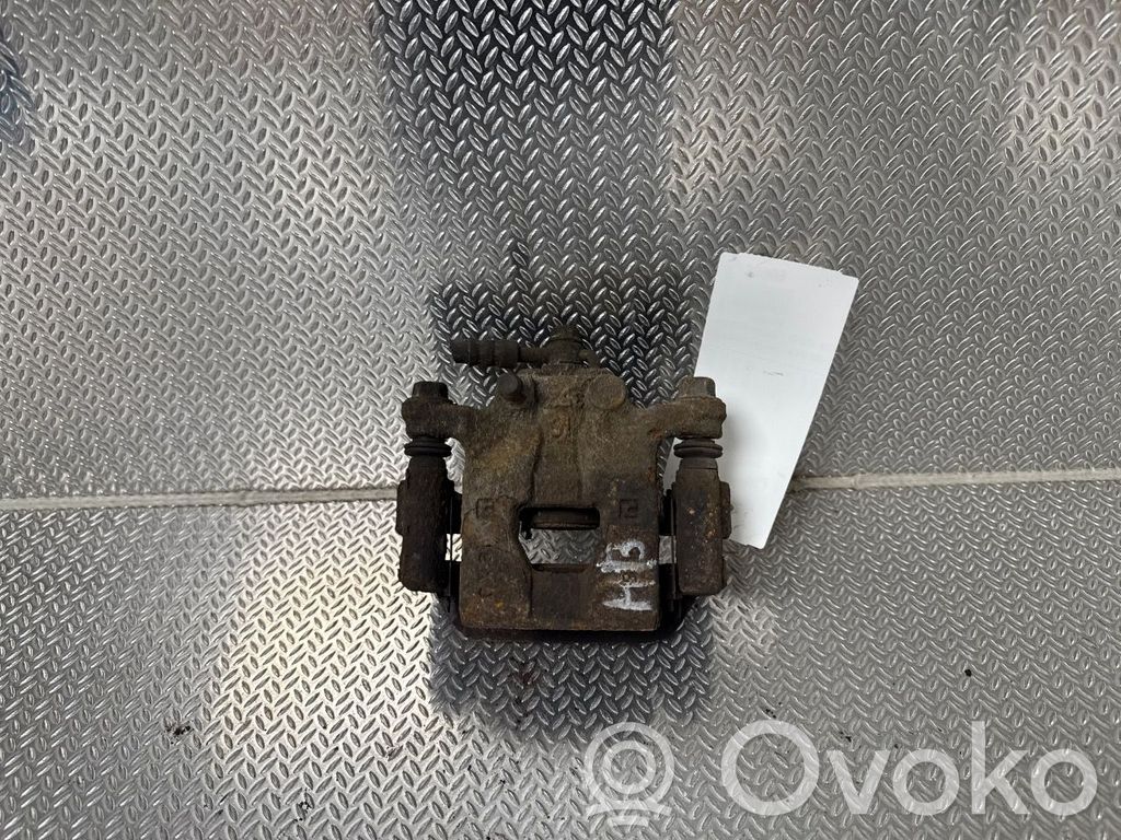 Nissan NV200 Caliper del freno trasero