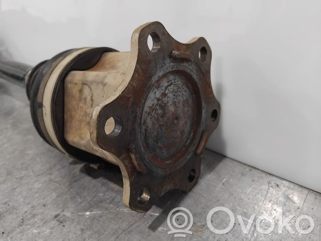 Volkswagen PASSAT B7 Eje de transmisión delantero 