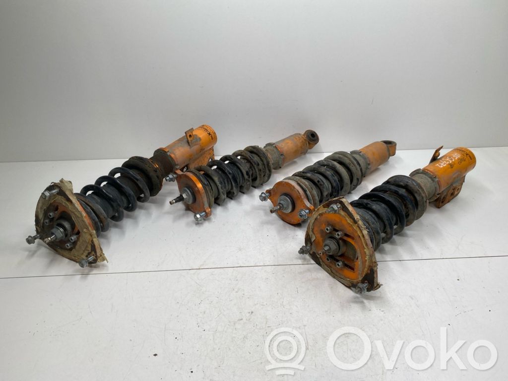 Subaru Legacy Front shock absorber with coil spring 