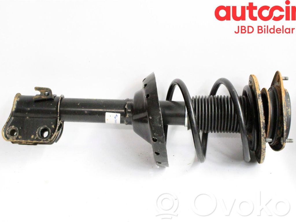 Subaru Legacy Front shock absorber with coil spring 