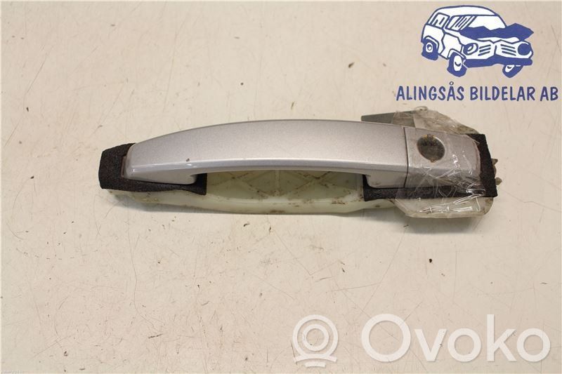 Manecilla externa puerta delantera