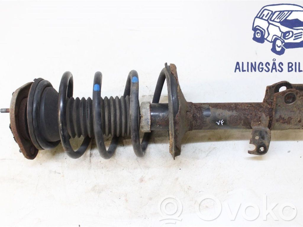 Toyota Corolla E120 E130 Front shock absorber with coil spring 