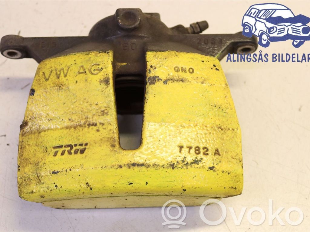 Volkswagen Golf VII Zacisk hamulcowy przedni 