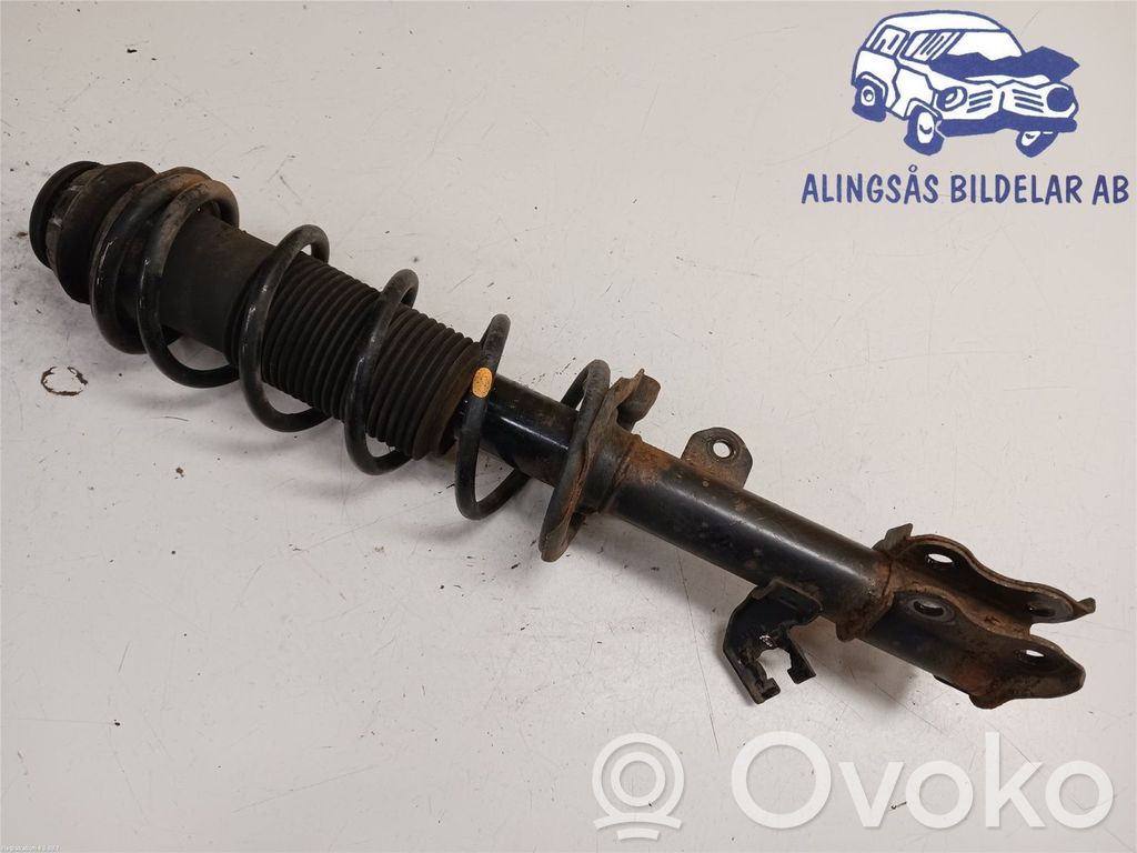 Nissan Note (E12) Front shock absorber with coil spring 