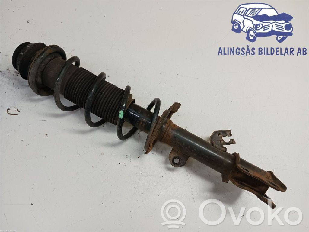 Nissan Note (E12) Front shock absorber with coil spring 