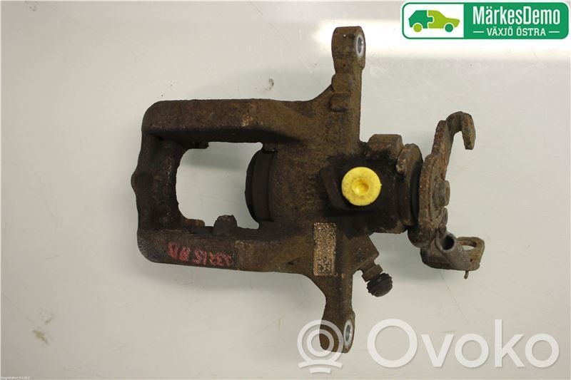 Opel Astra J Tylny zacisk hamulcowy 
