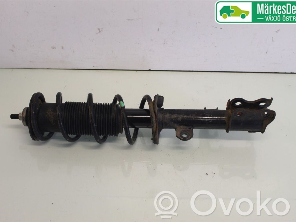 Nissan Note (E12) Front shock absorber with coil spring 
