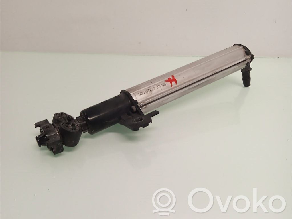 Headlight washer spray nozzle   6438T6