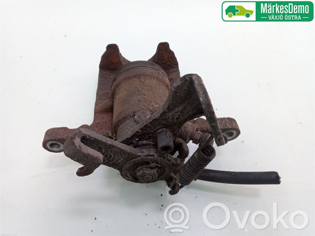 Opel Astra J Tylny zacisk hamulcowy 