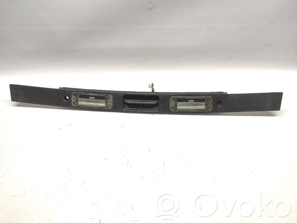 Tailgate/trunk side cover trim   4698809,FAROLINSMATRICULA