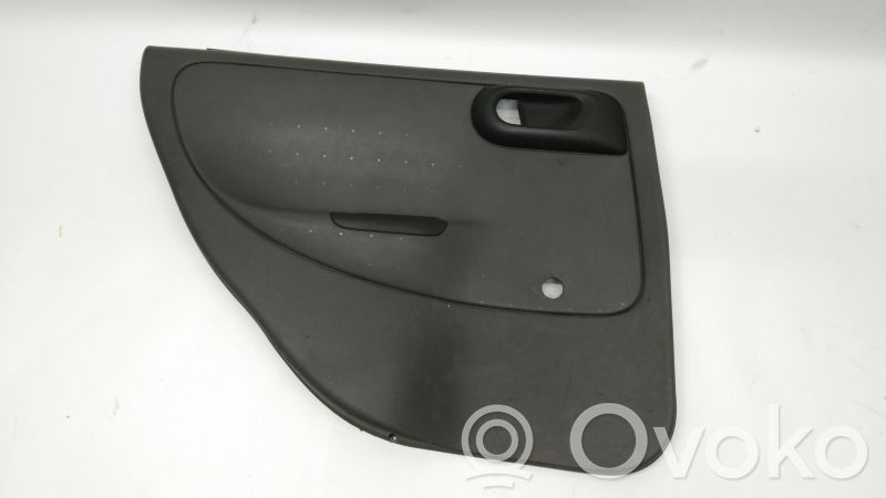Opel Corsa C Apšuvums aizmugurējām durvīm 