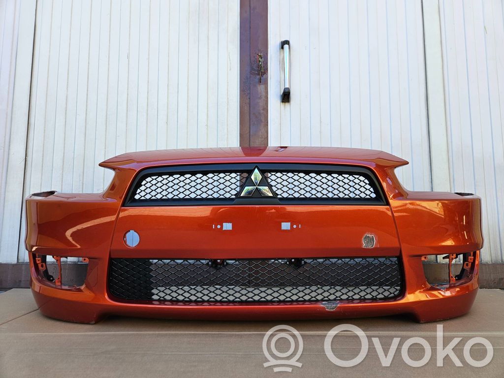 Mitsubishi Lancer VIII Parachoques delantero 