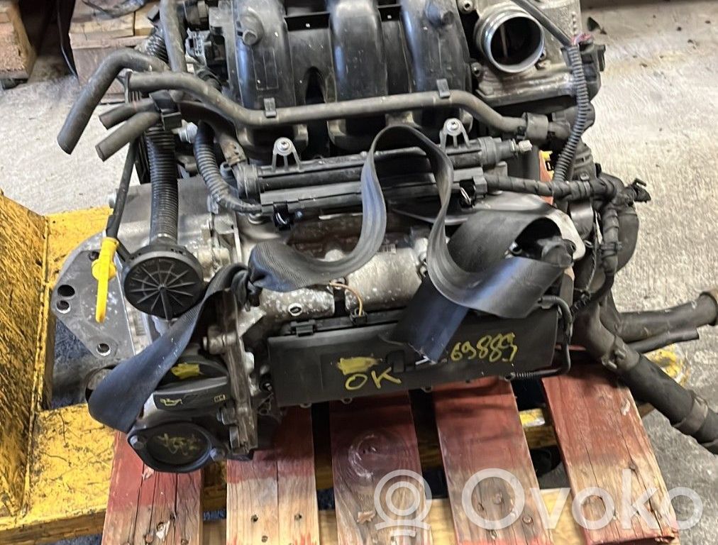 Motor   03E100034B