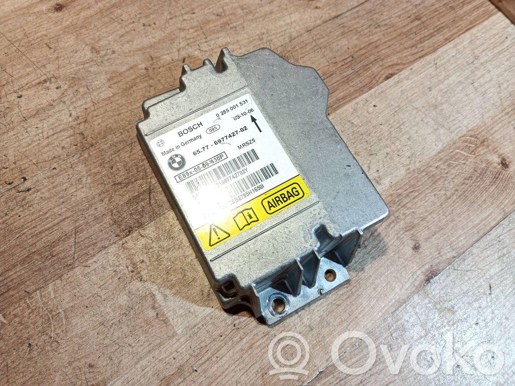 Module de contrôle airbag   0285001531,31697742702Y,6977427