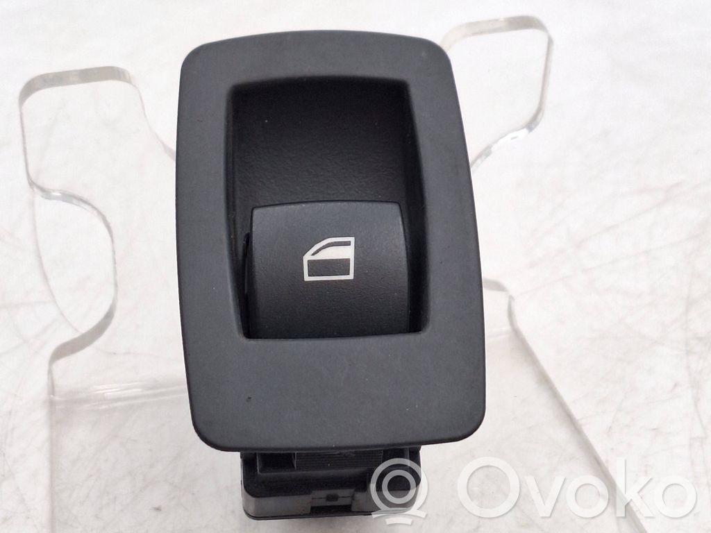 Electric window control switch   6945874,61316945874