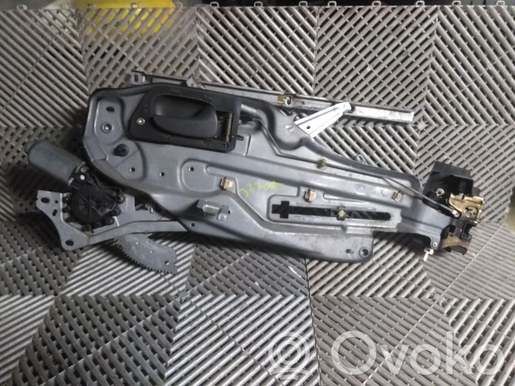 Renault Laguna I Elektryczny podnośnik szyby drzwi przednich 