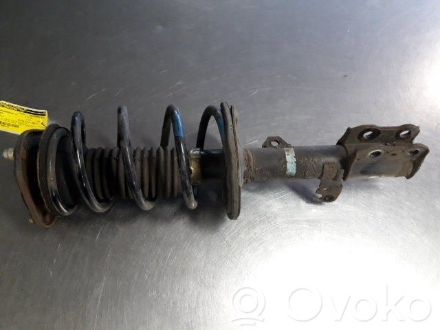 Front shock absorber with coil spring