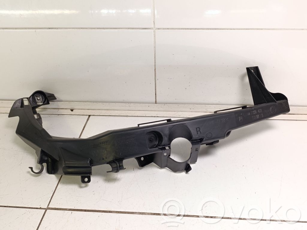 Headlight/headlamp mounting bracket   51117138402,7138402,15857711