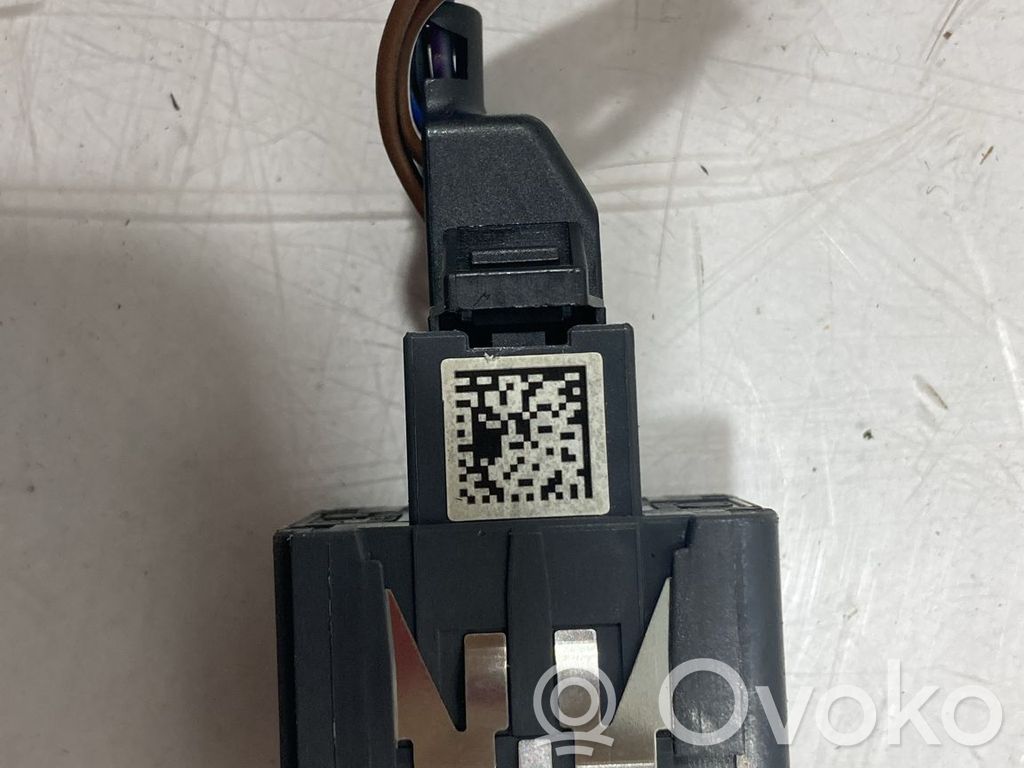 Volkswagen PASSAT B7 Interruptor de control de altura del faro delantero 