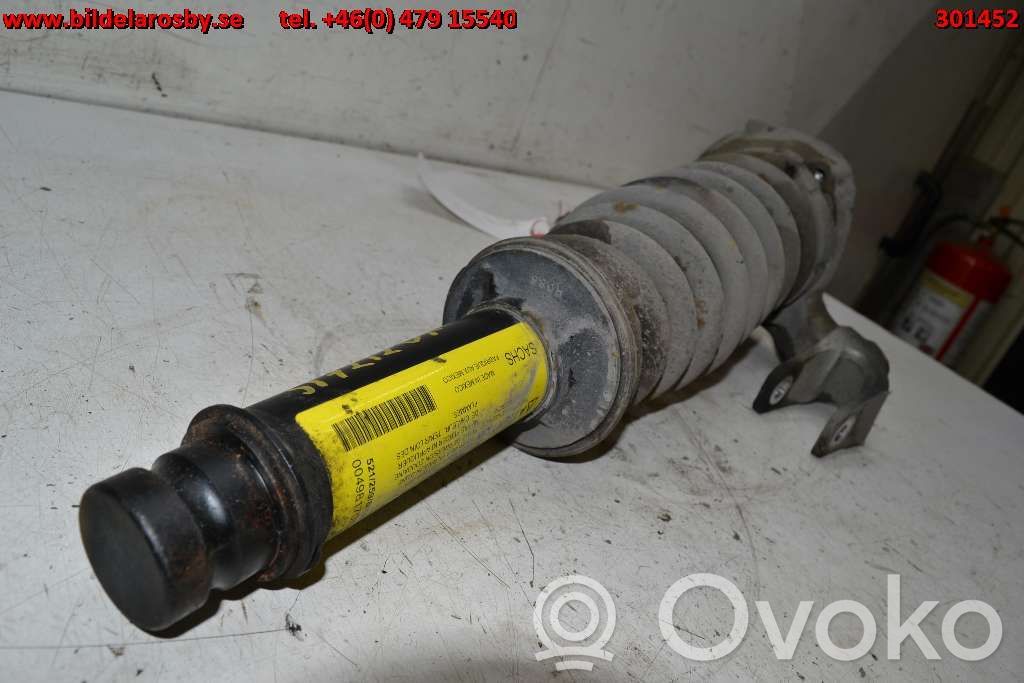 Cadillac SRX Front shock absorber with coil spring 