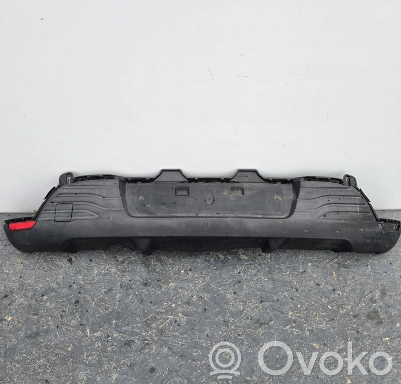 Renault Clio IV Moldura inferior del parachoques trasero 