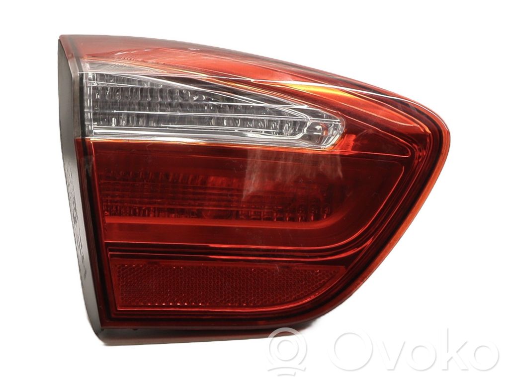KIA Rio Galinis žibintas dangtyje 