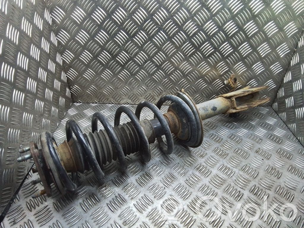 Front shock absorber with coil spring
