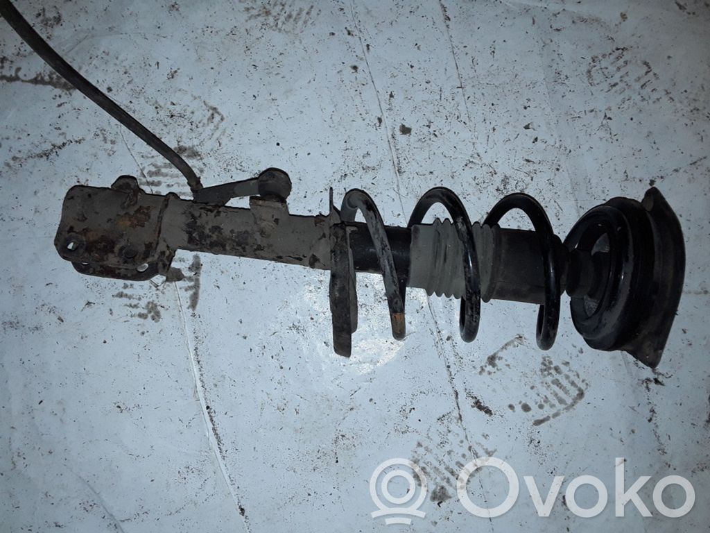 Nissan Note (E11) Rear shock absorber with coil spring 