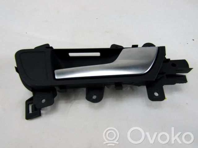 Manecilla interna puerta delantera   8K0839020