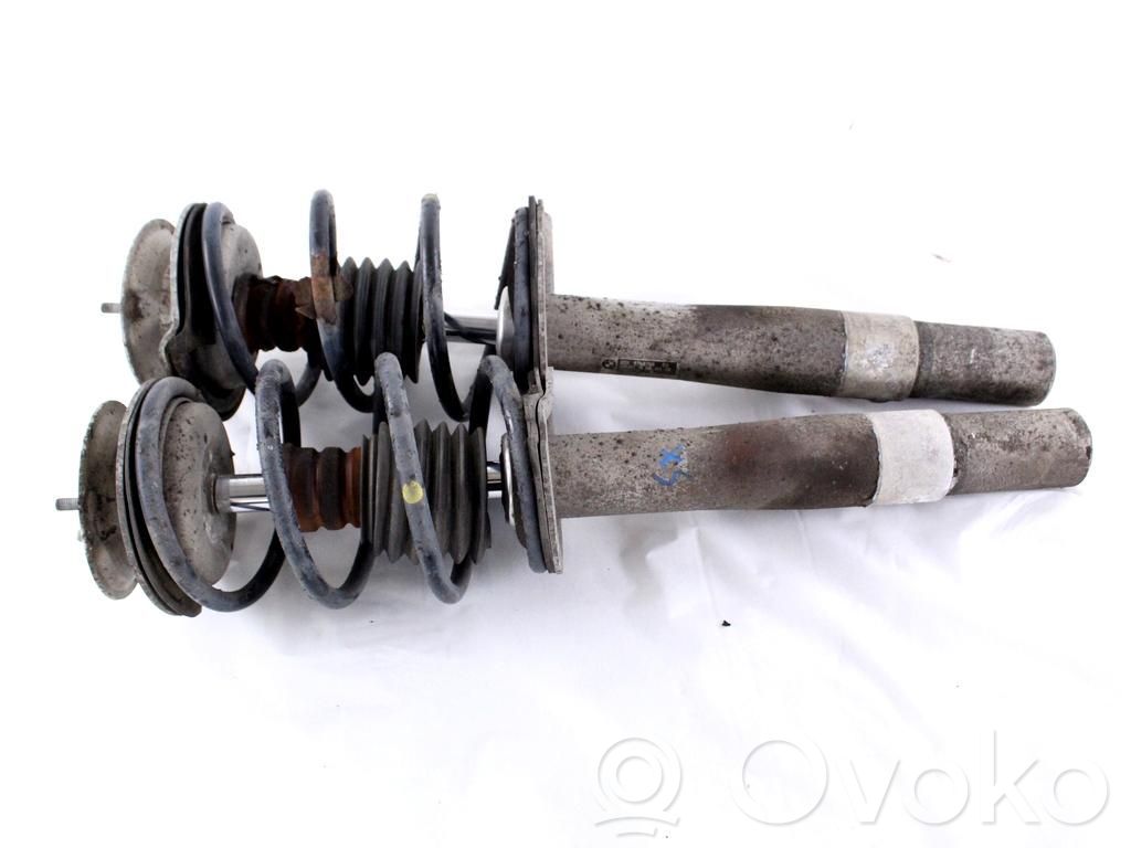 Front shock absorber with coil spring   19223