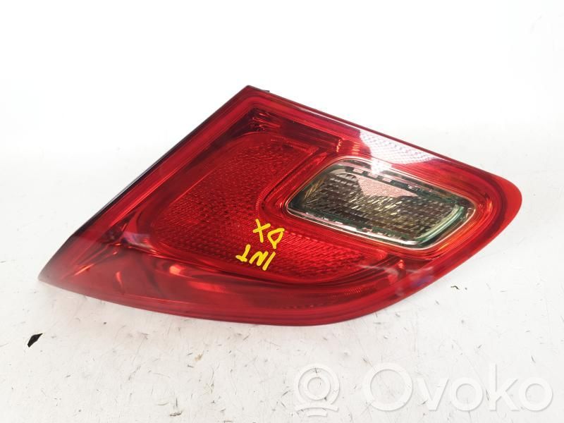 Opel Astra J Aizmugurējais lukturis virsbūvē 