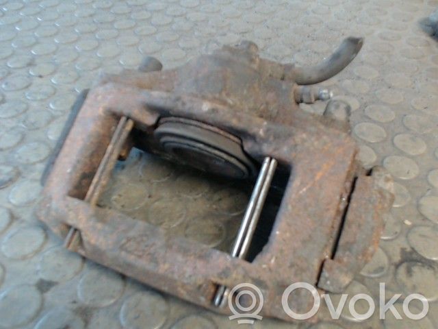 Opel Vectra A Zacisk hamulcowy przedni 