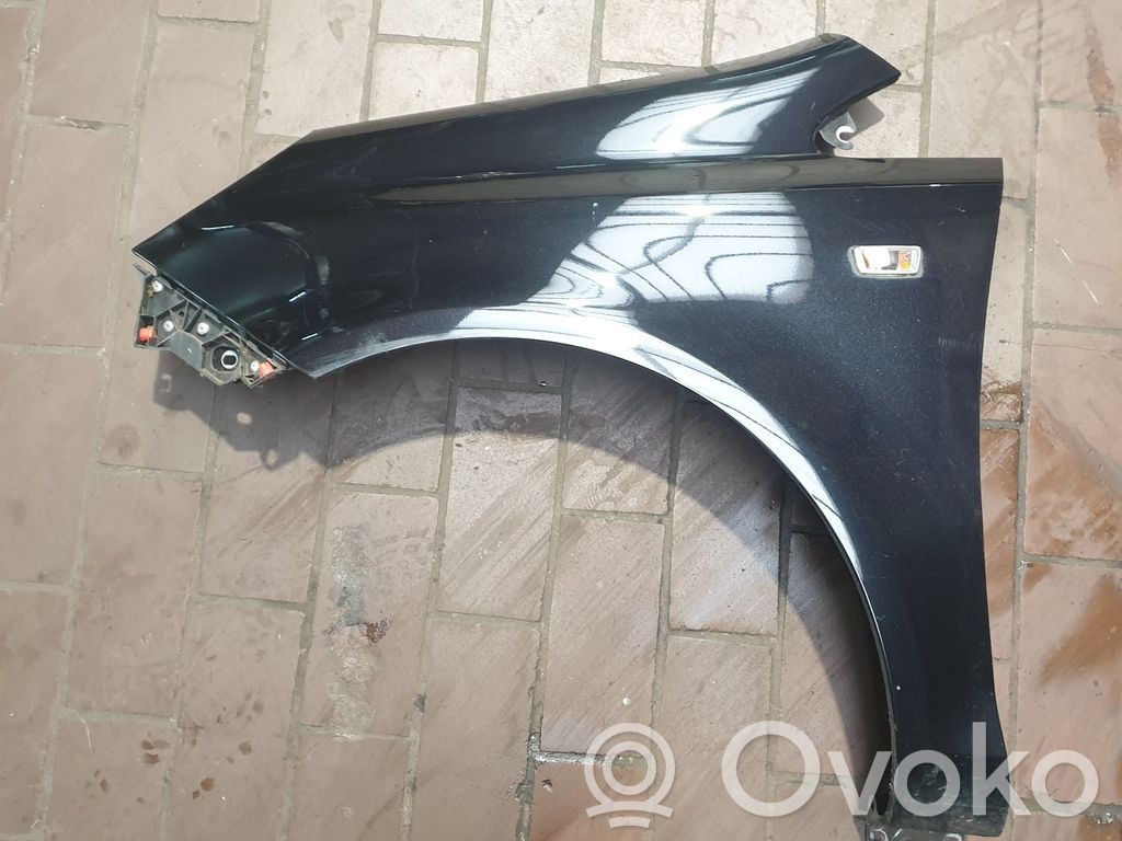 Opel Corsa D Błotnik przedni 