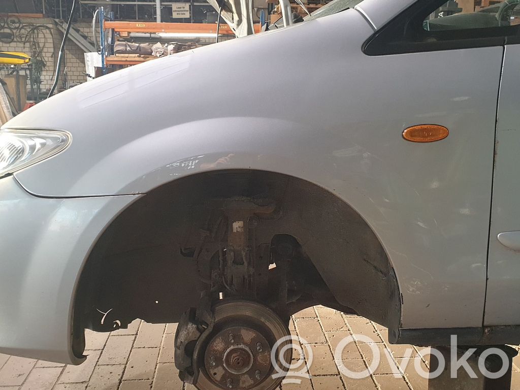 Mazda Premacy Sparnas 