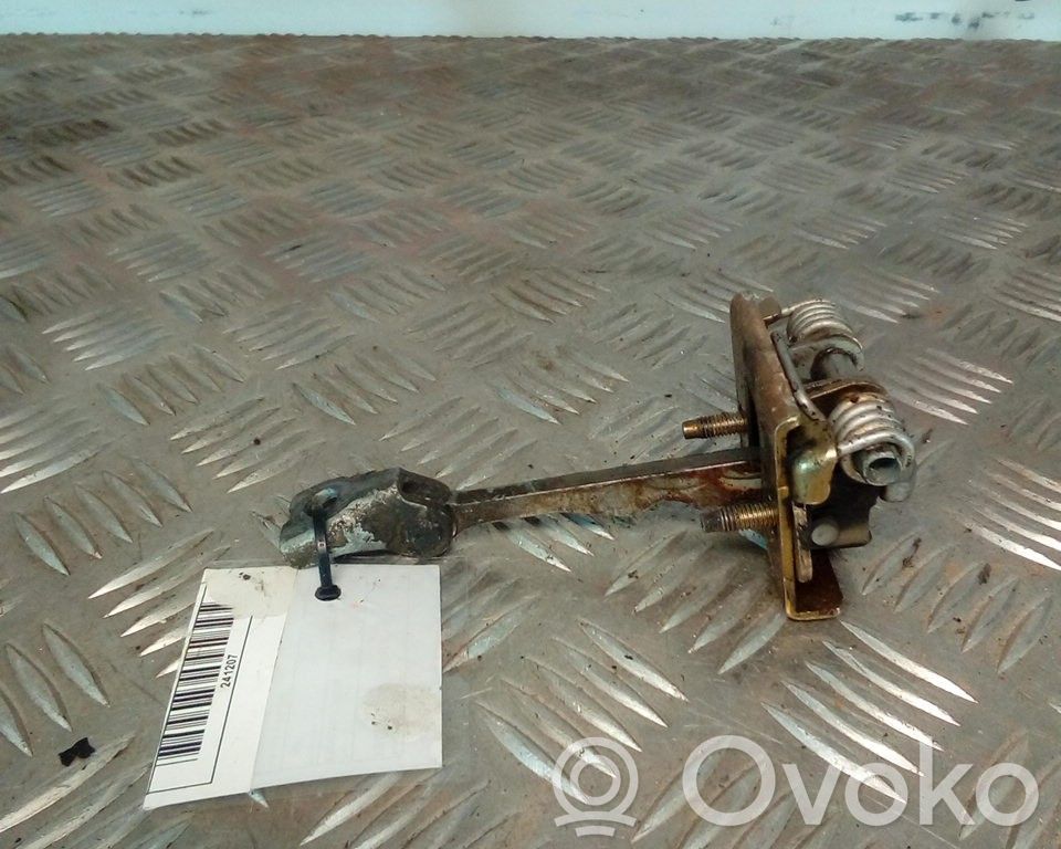 Front door check strap stopper   035B147A