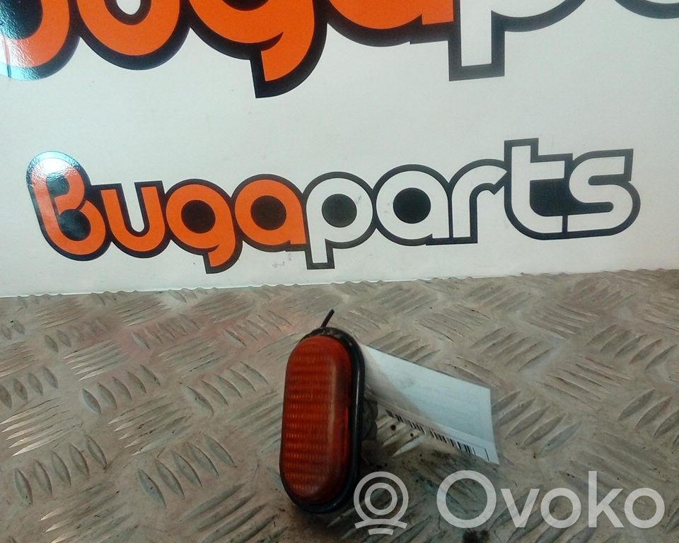 Front bumper turn signal   7700815977