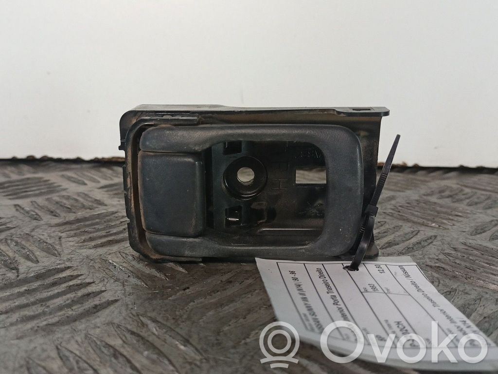 Manecilla interna puerta trasera   PUXADOR,DIREITO,NISSANSUNNYN14,TRASEIRO