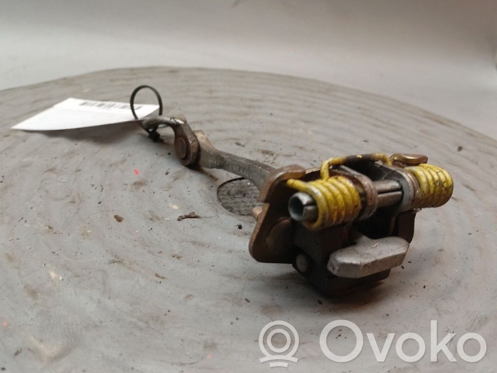 Front door check strap stopper   7700842857,7700842858