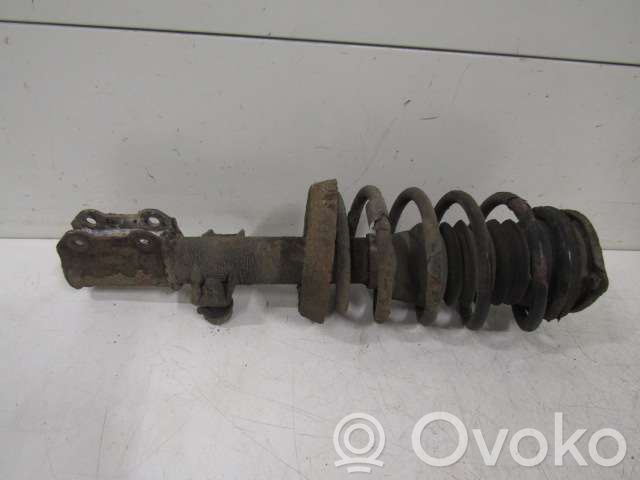 Front shock absorber with coil spring