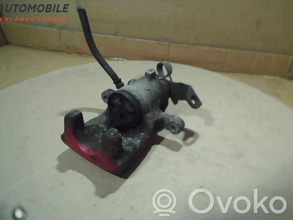Opel Astra G Tylny zacisk hamulcowy 