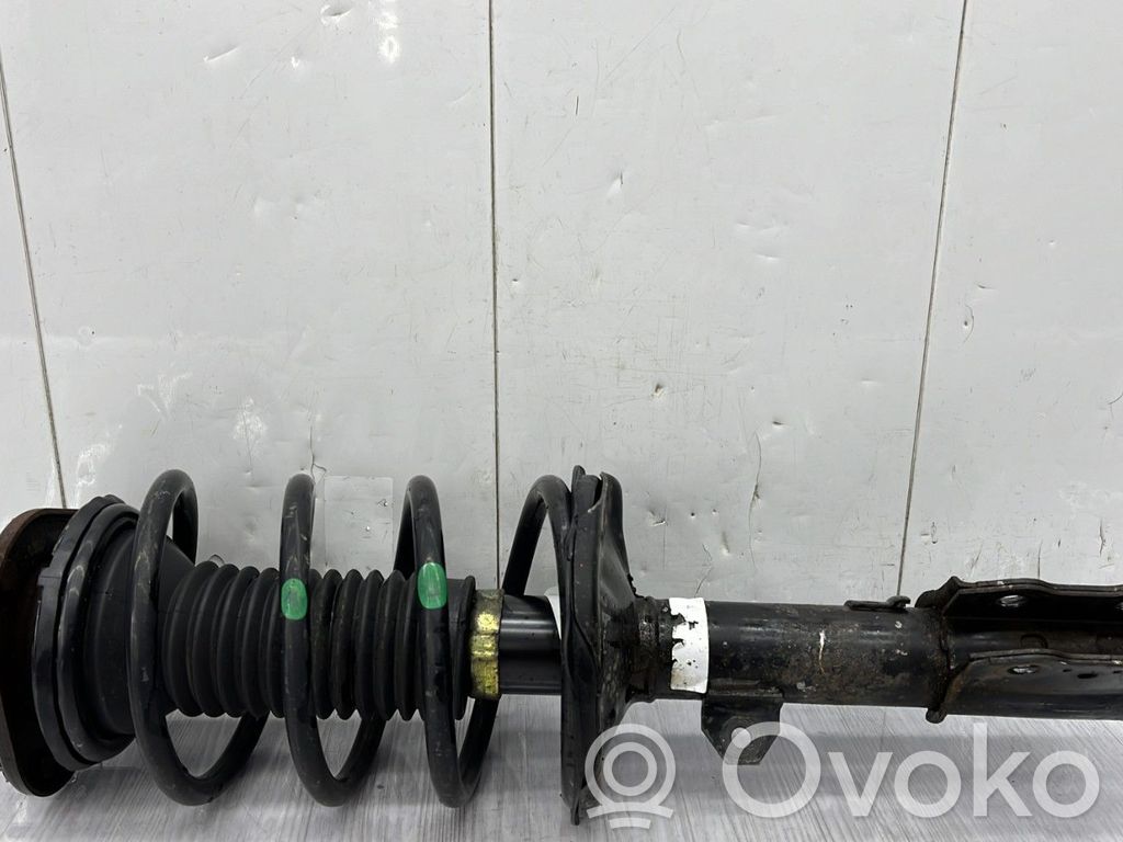 Toyota Corolla E120 E130 Front shock absorber with coil spring 