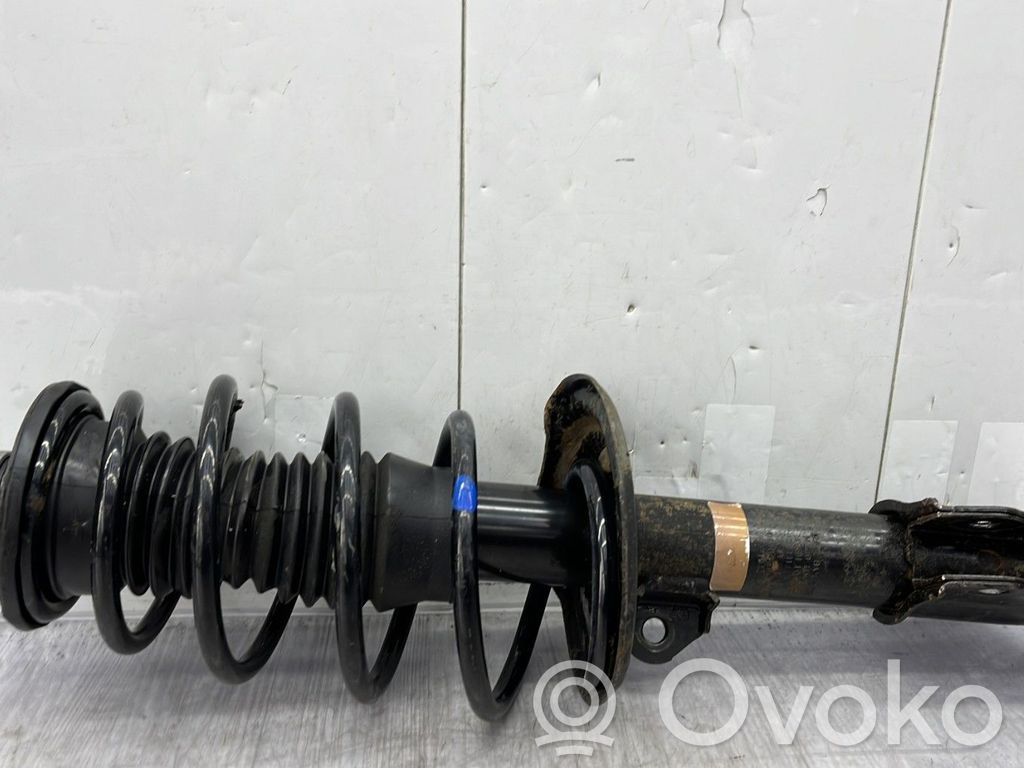 Toyota Yaris Amortyzator osi przedniej ze sprężyną 