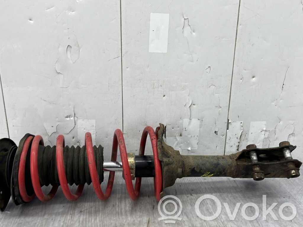 Toyota Yaris Amortyzator osi przedniej ze sprężyną 