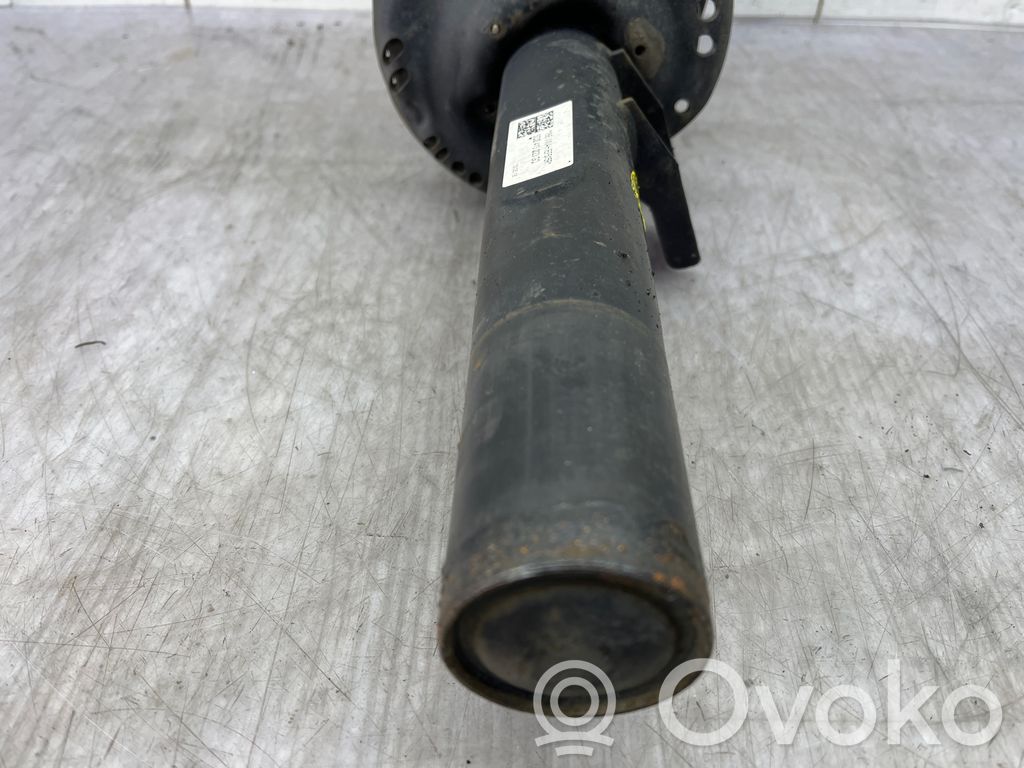 Volkswagen Golf VII Amortyzator osi przedniej ze sprężyną 