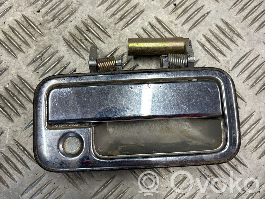 Manecilla externa puerta trasera