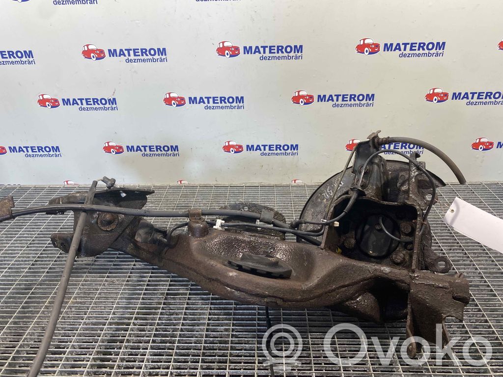 Nissan Qashqai+2 Olka-akselin laakeripesä 