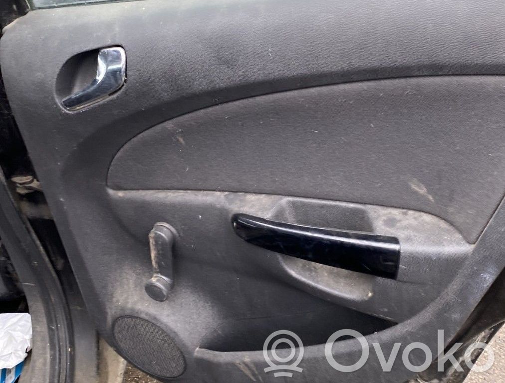 Opel Corsa D Apmušimas galinių durų (obšifke) 