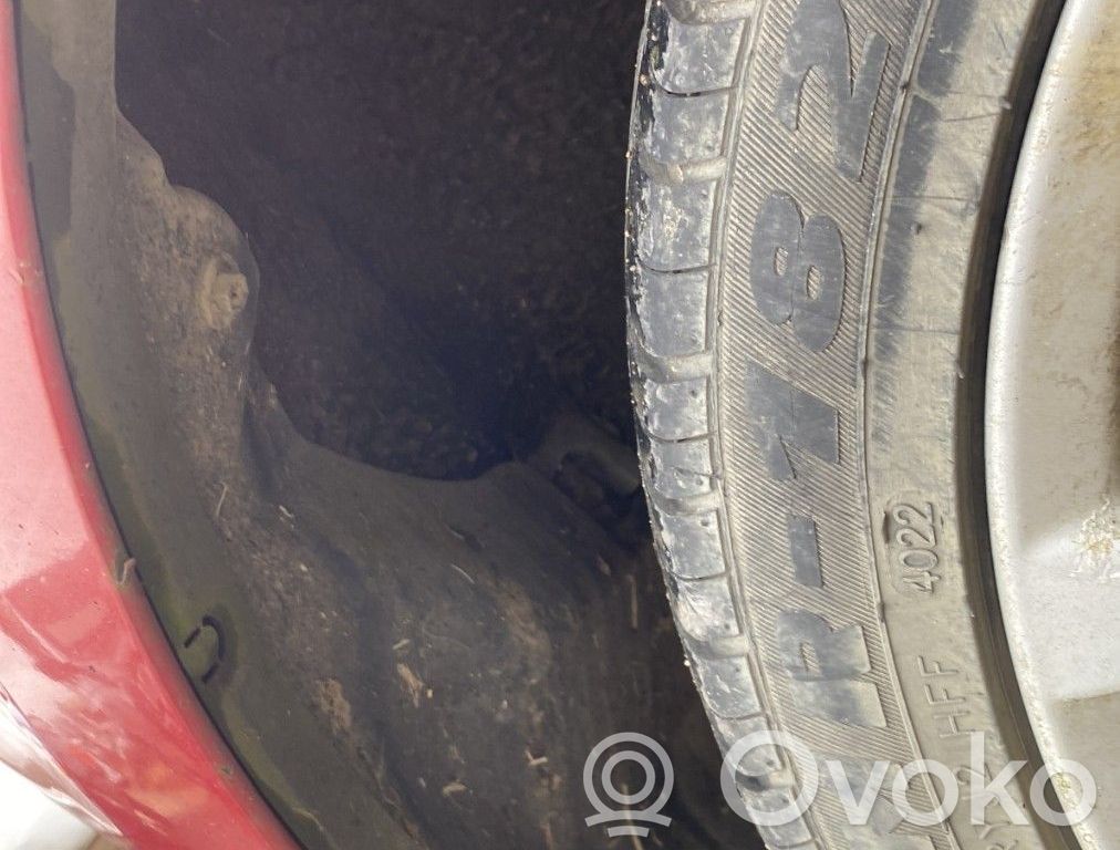 Mazda 2 Rivestimento paraspruzzi parafango posteriore 
